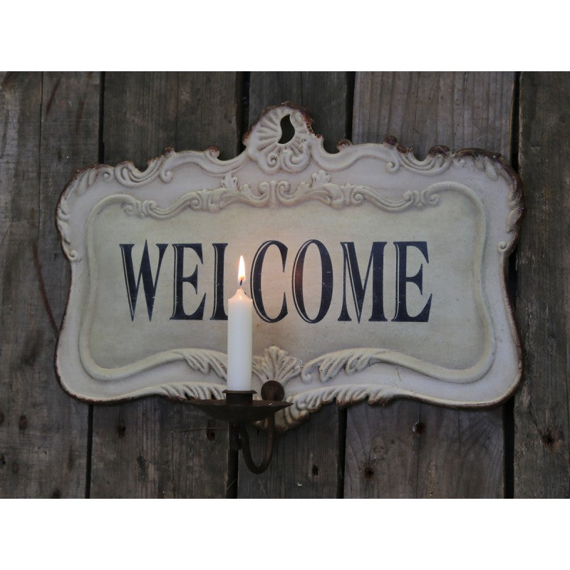Welcome kyltti kynttilänpidikkeellä