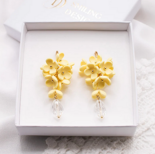 Selena-korvakorut vaaleankeltainen Smiling Design