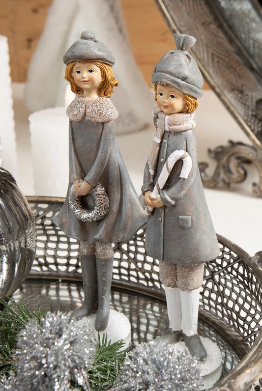 Talvinen tyttö tai  poika